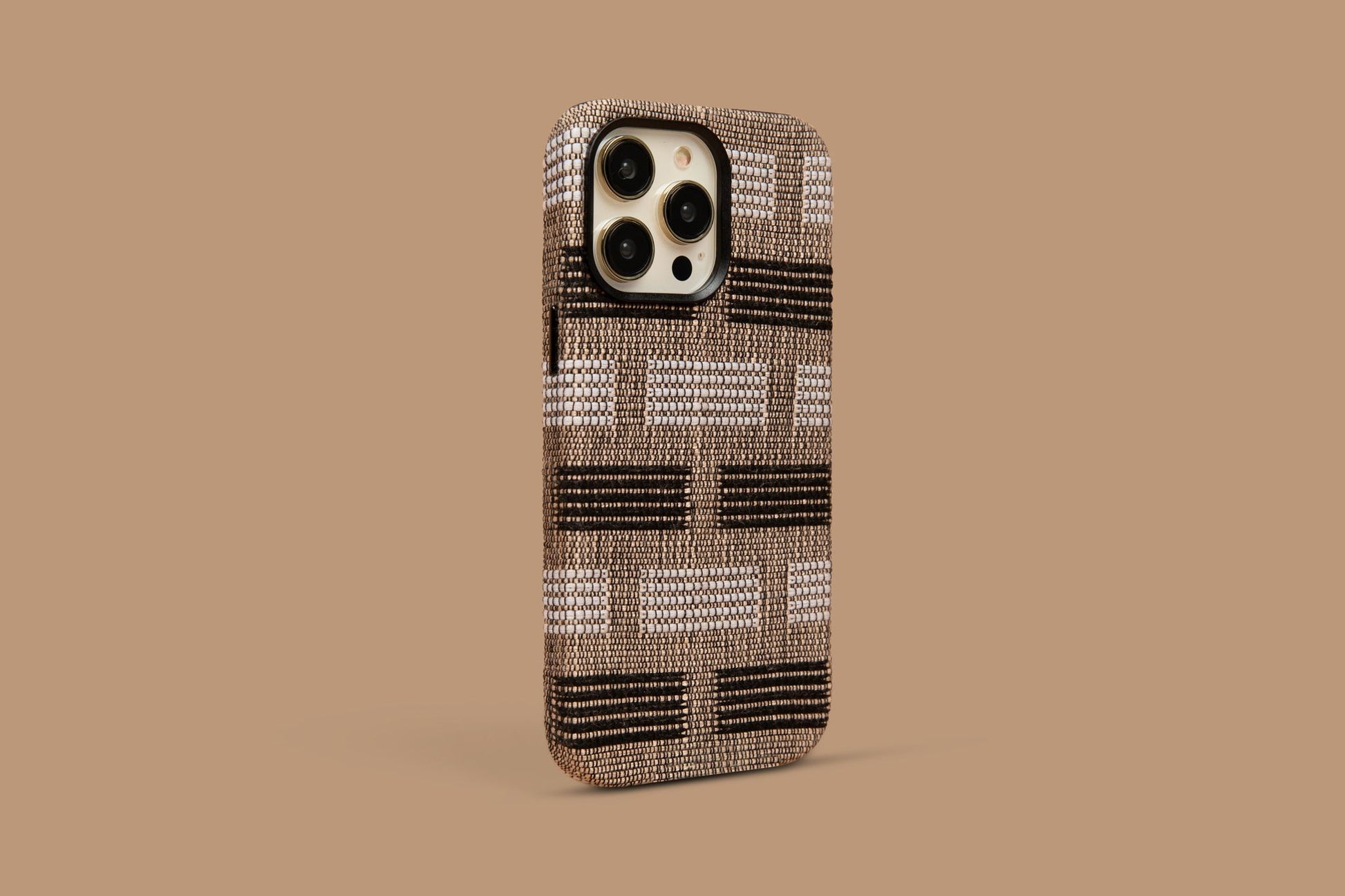 Benin Bands case showcasing a blend of brown with black and white bands on a warm background, for iPhone 12/13/14 Pro Max.