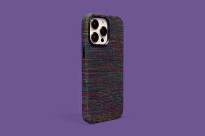 Kente-inspired multicolored fabric phone case on a purple background, blending traditional tapestry with modern elegance, compatible with iPhone 12, 13, and 14 Pro Max.